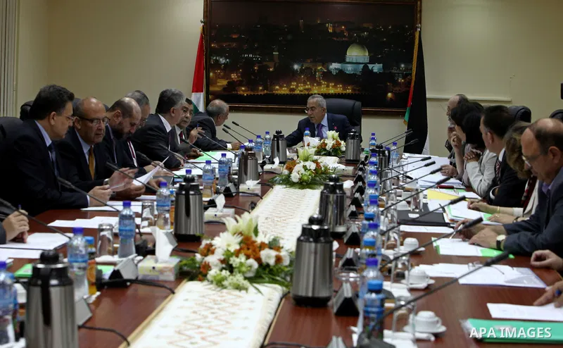 Palestinian Prime Minister, Salam Fayyad meets with member of the Palestinian government, in the West Bank city of Ramallah, on Sep. 04, 2102. Photo by Mustafa Abu Dayeh