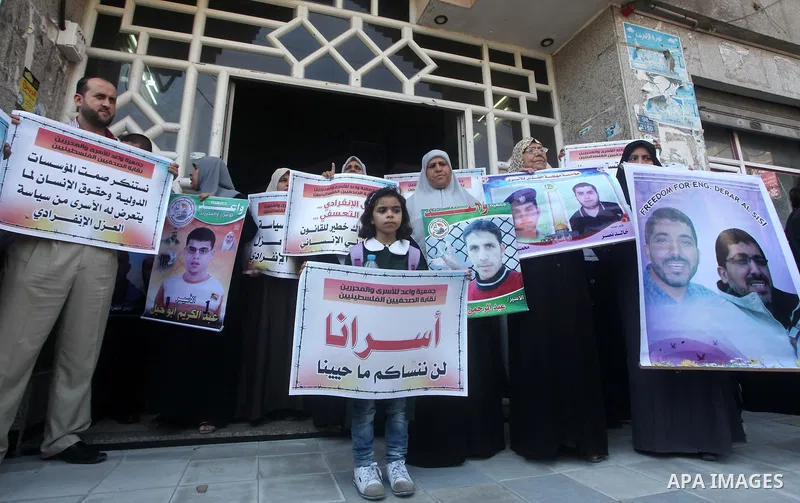 Palestinian journalists and families prisoners during a protest in Gaza Cityto demand the release of Palestinian prisoners from Israeli jails September 5, 2012. Photo by Ashraf Amra