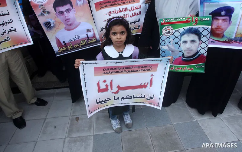 Palestinian journalists and families prisoners during a protest in Gaza Cityto demand the release of Palestinian prisoners from Israeli jails September 5, 2012. Photo by Ashraf Amra