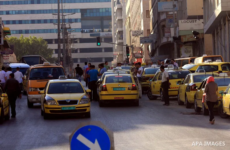 Palestinian taxi drivers park their cars during a protest against rising fuel prices and the high cost of living, in the West Bank city of Nablus, Wednesday Sept. 6, 2012. Photo by Nedal Eshtayah