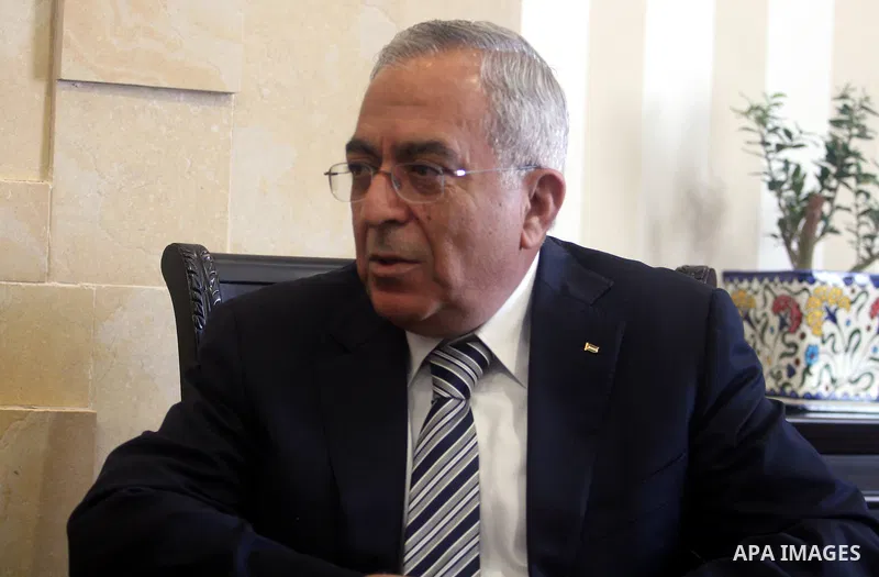 Palestinian prime minister Salam Fayyad (R) meets with his Italian counterpart Giulio Terzi at the foreign ministry in the West Bank city of Ramallah on September 6, 2012. Photo by Issam Rimawi