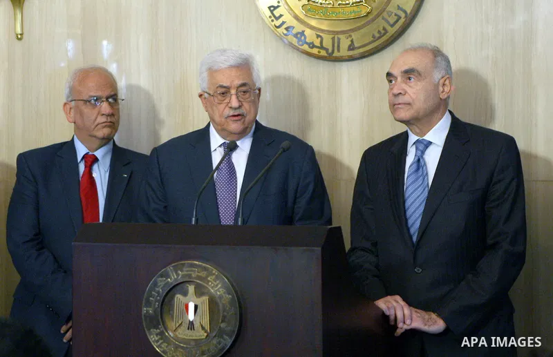 Palestinian President Mahmoud Abbas (Abu Mazen) meets with Egyptian President Mohamed Morsi in Cairo, on Sep. 06, 2012. Photo by Thaer Ganaim