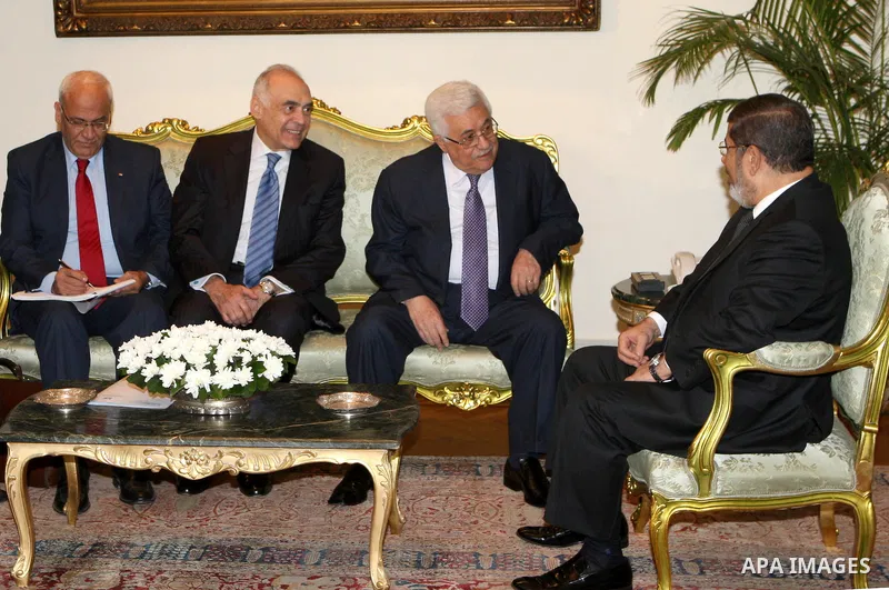 Palestinian President Mahmoud Abbas (Abu Mazen) meets with Egyptian President Mohamed Morsi in Cairo, on Sep. 06, 2012. Photo by Thaer Ganaim