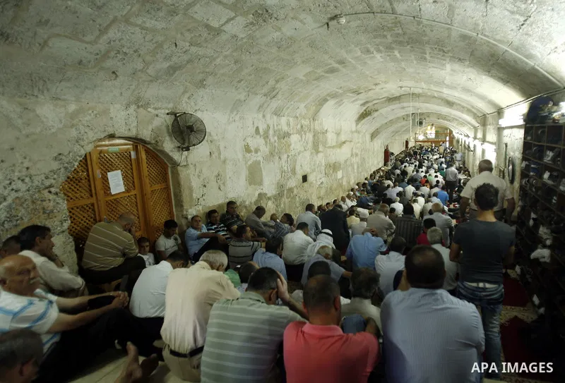 Palestinian Muslims pray in the Dome of the Rock on the compound known to Muslims as al-Haram al-Sharif and to Jews as Temple Mount during the second Friday of the holy month of Ramadan in Jerusalem's Old City on Sep. 07...