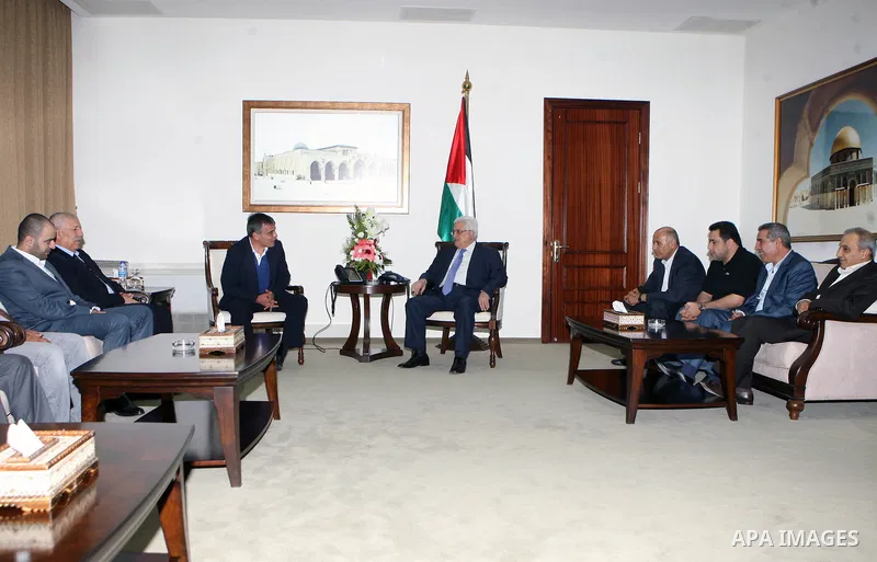 Palestinian President Mahmoud Abbas (Abu Mazen) meets with of the committee supervising the elections, the presidency of the Sports Federation in the West Bank city of Ramallah on Sep. 07, 2012. Photo by Thaer Ganaim