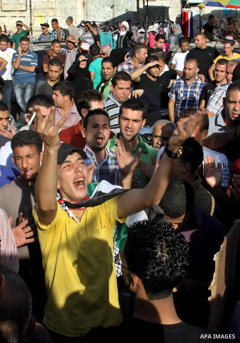 Palestinians protest against rising fuel prices and the high cost of living, in the West Bank city of Nablus, Sept. 8, 2012. Photo by Nedal Eshtayah