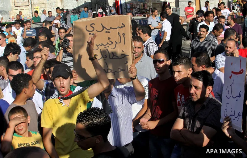 Palestinians protest against rising fuel prices and the high cost of living, in the West Bank city of Nablus, Sept. 8, 2012. Photo by Nedal Eshtayah