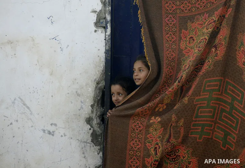 Palestinian girls play in front of their house in Rafah refugee camp in the southern of Gaza Strip, on September 08. 2012 Photo by Eyad Al Baba