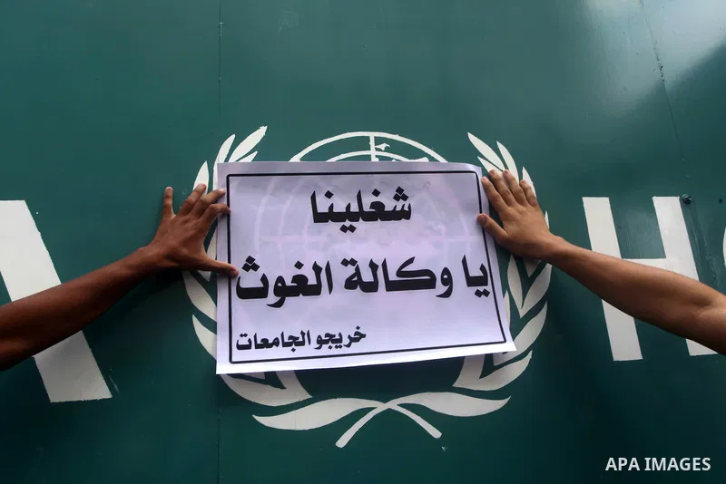 Palestinians take part in a protest against unemployment and the economic situation in the Gaza Strip, in front of the UNRWA headquarters in Gaza city on Sep. 09, 2012. Photo by Ashraf Amra
