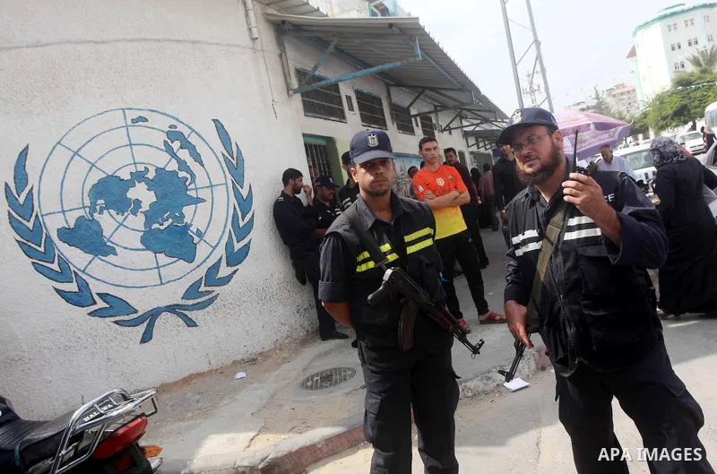 Palestinians take part in a protest against unemployment and the economic situation in the Gaza Strip, in front of the UNRWA headquarters in Gaza city on Sep. 09, 2012. Photo by Ashraf Amra