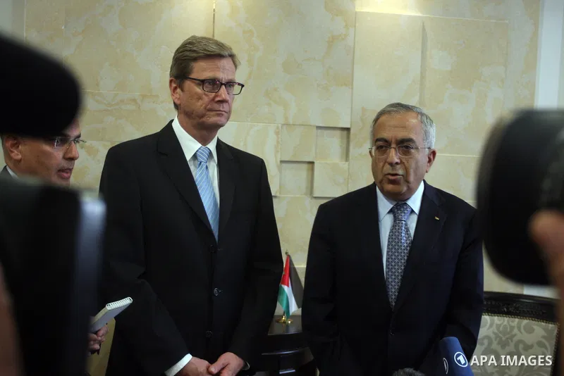 Palestinian Prime Minister Salam Fayyad (R) meets with Germany's Foreign Minister Guido Westerwelle in the West Bank city of Ramallah September 9, 2012. Westerwelle urged Iran on Sunday to bring "substantial offers" to a...
