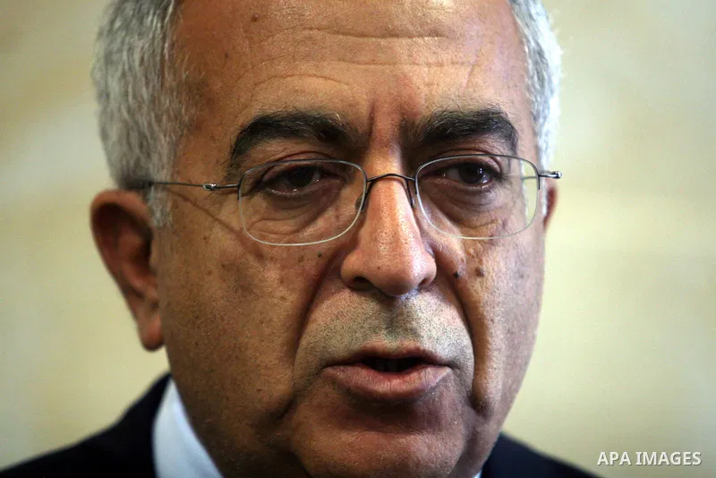 Palestinian Prime Minister Salam Fayyad speaks to the media following a meeting with German Foreign Minister Guido Westerwelle, in the West Bank city of Ramallah, 09 September 2012. Westerwelle came for a one day visit t...