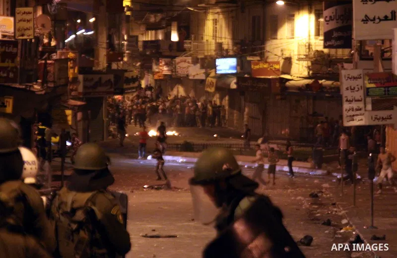 Palestinian security forces disperse crowds during clashes at a demonstration against high living costs and the government in the West Bank city of Nablus September 10, 2012. The Palestinian Authority, which governs Pale...