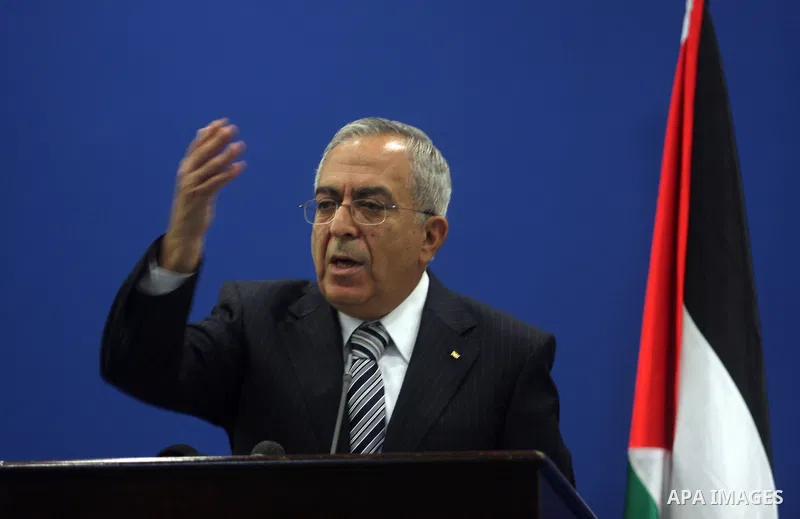 Palestinian Prime Minister Salam Fayyad addresses the media during a news conference in the West Bank city of Ramallah September 11, 2012. Demonstrations against the rising cost of living turned violent in the cities of...