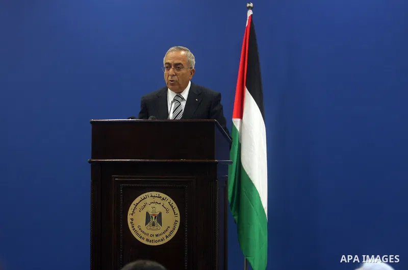 Palestinian Prime Minister Salam Fayyad addresses the media during a news conference in the West Bank city of Ramallah September 11, 2012. Demonstrations against the rising cost of living turned violent in the cities of...