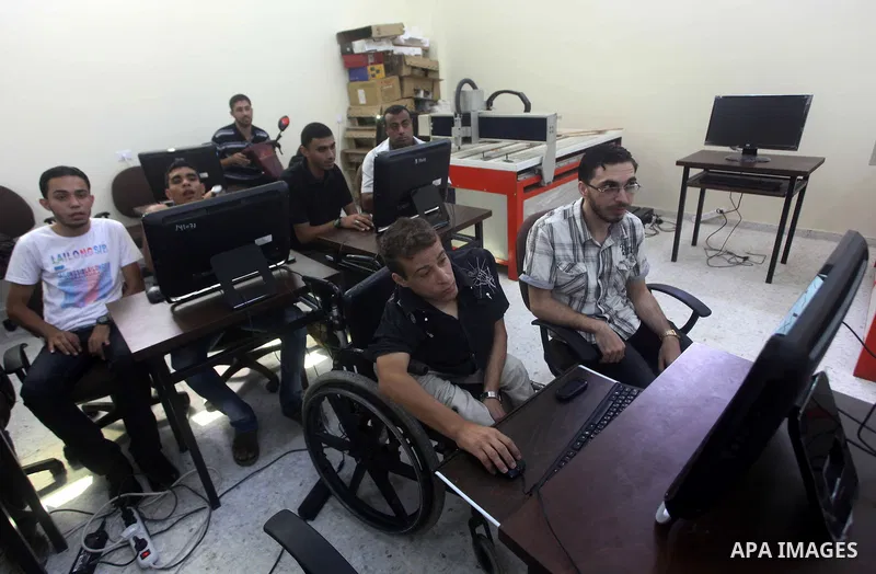 Palestinian students at the Islamic university of Gaza, participate in a project funded by the Turkish President ragab ardogan in Gaza City, on Sep. 12, 2012. during visit Consul General Shaker Ozcan Turkish Torlnr. Phot...
