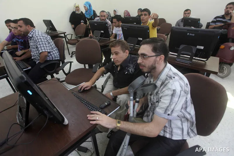 Palestinian students at the Islamic university of Gaza, participate in a project funded by the Turkish President ragab ardogan in Gaza City, on Sep. 12, 2012. during visit Consul General Shaker Ozcan Turkish Torlnr. Phot...