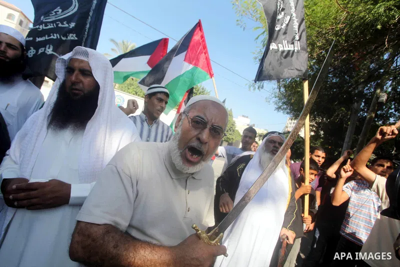Palestinians chant during protest in front of the United Nations headquarters in Gaza city against the showing of a movie that is allegedly offensive to Muslim Prophet Mohammad, Sept 12, 2012. Photo by Ashraf Amra