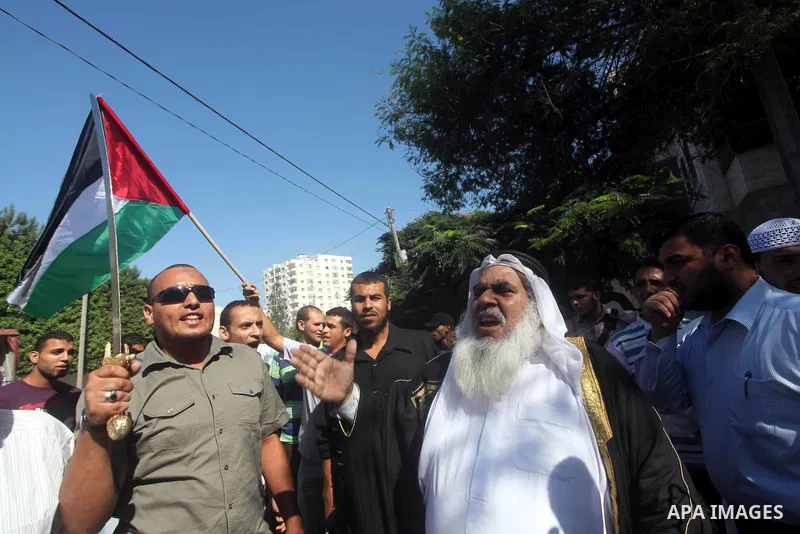 Palestinians chant during protest in front of the United Nations headquarters in Gaza city against the showing of a movie that is allegedly offensive to Muslim Prophet Mohammad, Sept 12, 2012. Photo by Ashraf Amra