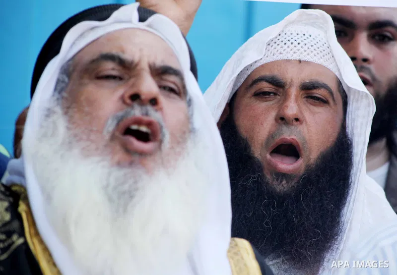 Palestinians chant during protest in front of the United Nations headquarters in Gaza city against the showing of a movie that is allegedly offensive to Muslim Prophet Mohammad, Sept 12, 2012. Photo by Ashraf Amra