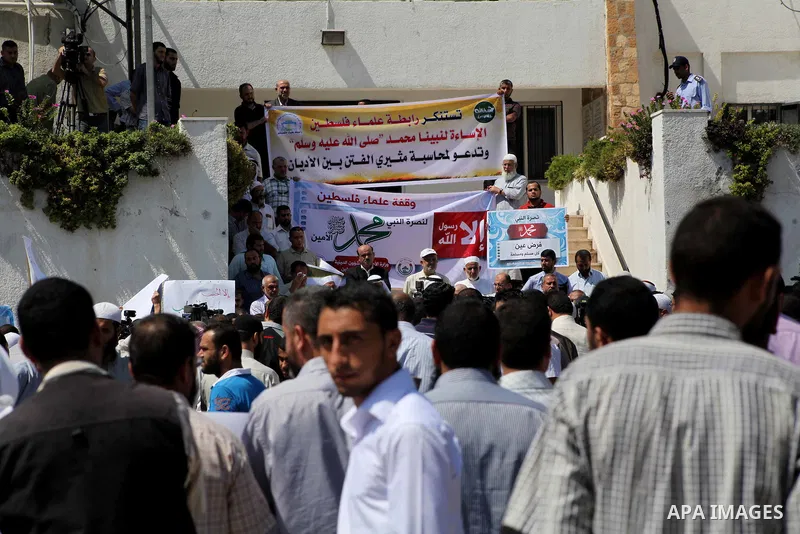 Palestinians protest against the movie, "Innocence of Muslims," in front of the Legislative Council in Gaza City, Sept. 13, 2012. Muslim anger over perceived Western insults to Islam has exploded several times, most rece...