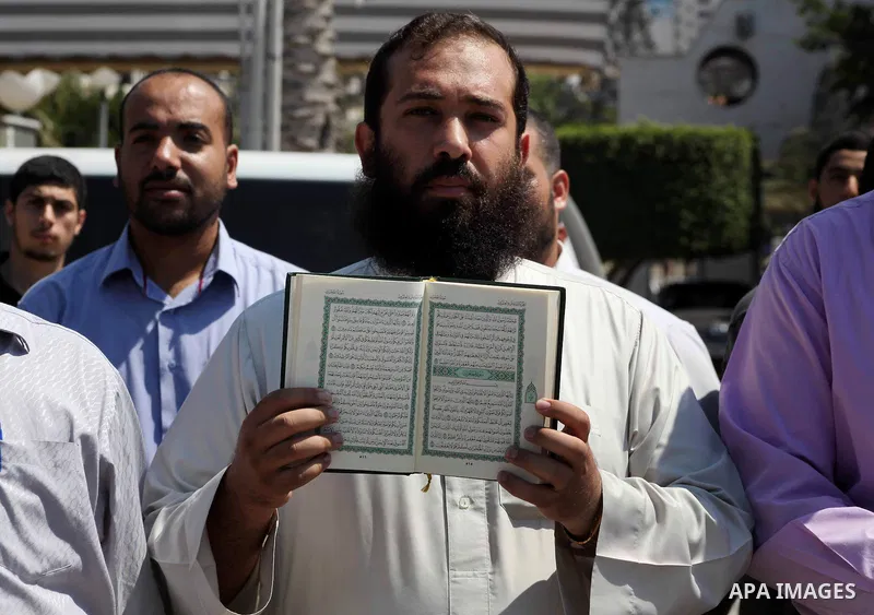Palestinians protest against the movie, "Innocence of Muslims," in front of the Legislative Council in Gaza City, Sept. 13, 2012. Muslim anger over perceived Western insults to Islam has exploded several times, most rece...
