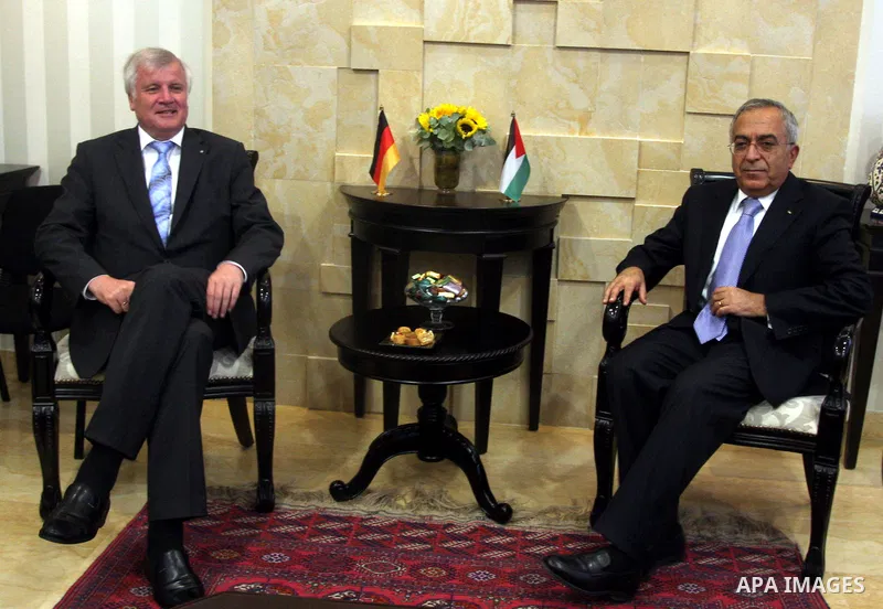 Palestinian Prime Minister, Salam Fayyad, meets with Mr. Giuliano Bezabia Mayor Italian city of Milan, in the West Bank city of Ramallah, on Sep. 12, 2012. Photo by Issam Rimawi
