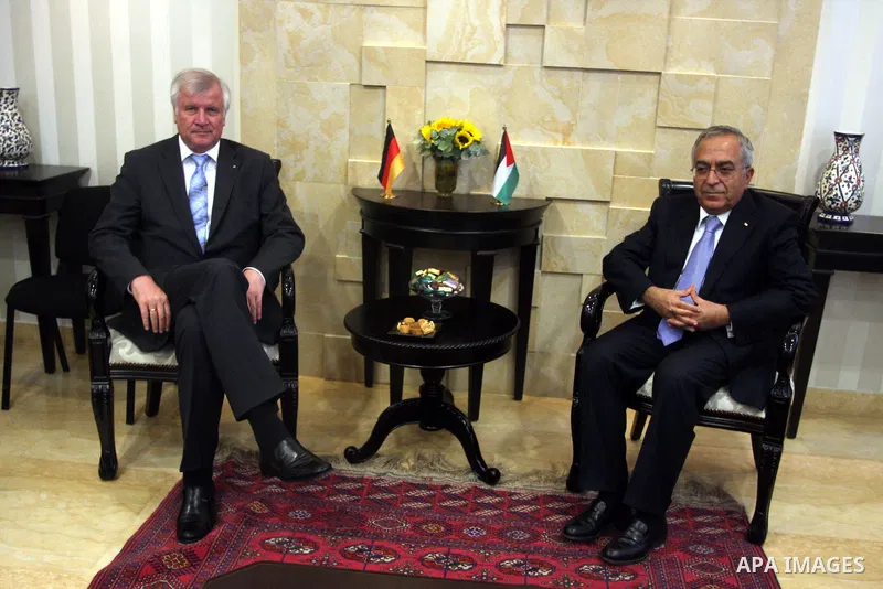 Palestinian Prime Minister, Salam Fayyad, meets with Mr. Giuliano Bezabia Mayor Italian city of Milan, in the West Bank city of Ramallah, on Sep. 12, 2012. Photo by Issam Rimawi