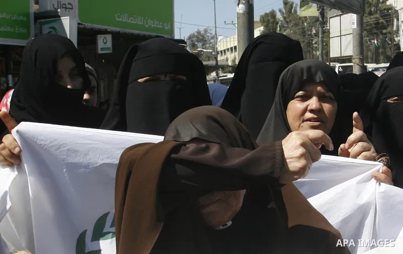 Palestinian women shout anti-US slogans during a demonstration against the controversial film 'Innocence of Muslims' in Rafah southern Gaza strip, on September 14, 2012. The controversial low budget film reportedly made...