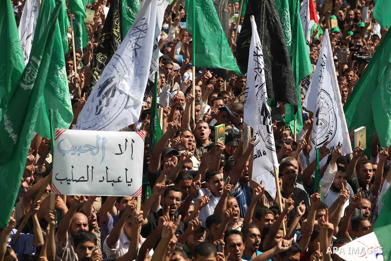 Palestinians shout anti-U.S. slogans during a demonstration against the controversial film 'Innocence of Muslims' in Gaza City, on September 14, 2012. The controversial low budget film reportedly made by an Israeli-Ameri...