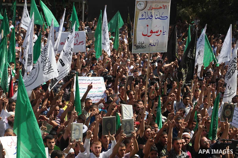 Palestinians shout anti-U.S. slogans during a demonstration against the controversial film 'Innocence of Muslims' in Gaza City, on September 14, 2012. The controversial low budget film reportedly made by an Israeli-Ameri...