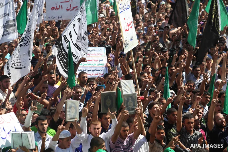 Palestinians shout anti-U.S. slogans during a demonstration against the controversial film 'Innocence of Muslims' in Gaza City, on September 14, 2012. The controversial low budget film reportedly made by an Israeli-Ameri...