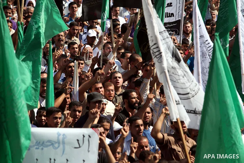 Palestinians shout anti-U.S. slogans during a demonstration against the controversial film 'Innocence of Muslims' in Gaza City, on September 14, 2012. The controversial low budget film reportedly made by an Israeli-Ameri...
