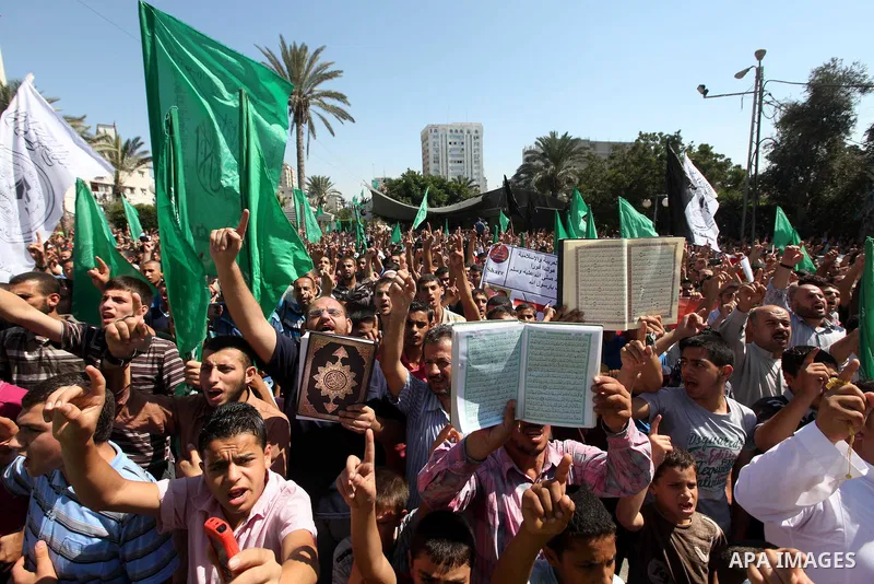 Palestinians shout anti-U.S. slogans during a demonstration against the controversial film 'Innocence of Muslims' in Gaza City, on September 14, 2012. The controversial low budget film reportedly made by an Israeli-Ameri...