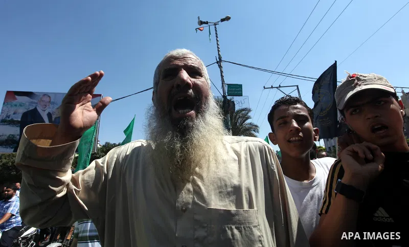 Palestinians shout anti-U.S. slogans during a demonstration against the controversial film 'Innocence of Muslims' in Gaza City, on September 14, 2012. The controversial low budget film reportedly made by an Israeli-Ameri...
