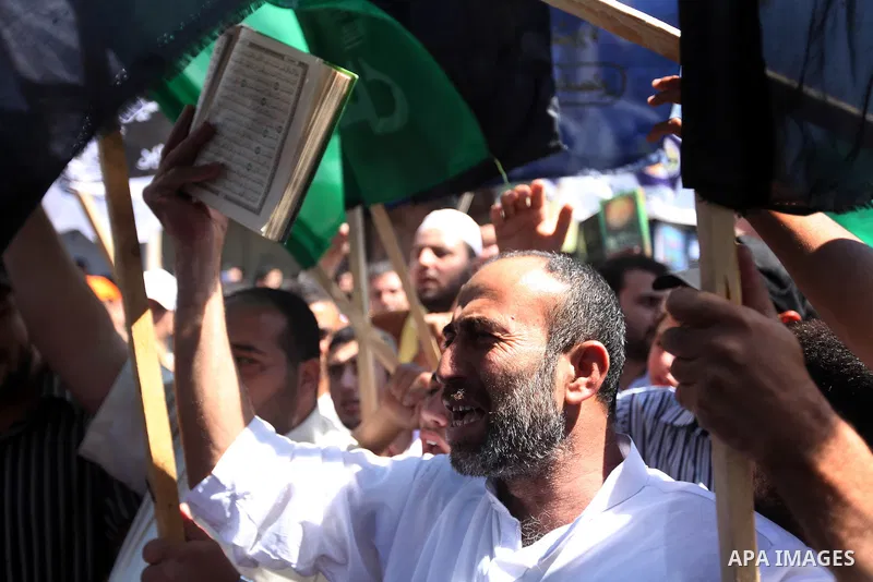 Palestinians shout anti-U.S. slogans during a demonstration against the controversial film 'Innocence of Muslims' in Gaza City, on September 14, 2012. The controversial low budget film reportedly made by an Israeli-Ameri...