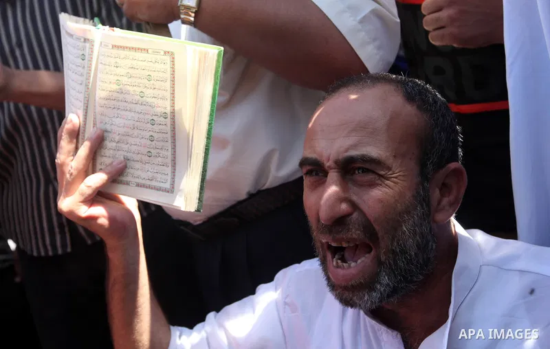 Palestinians shout anti-U.S. slogans during a demonstration against the controversial film 'Innocence of Muslims' in Gaza City, on September 14, 2012. The controversial low budget film reportedly made by an Israeli-Ameri...