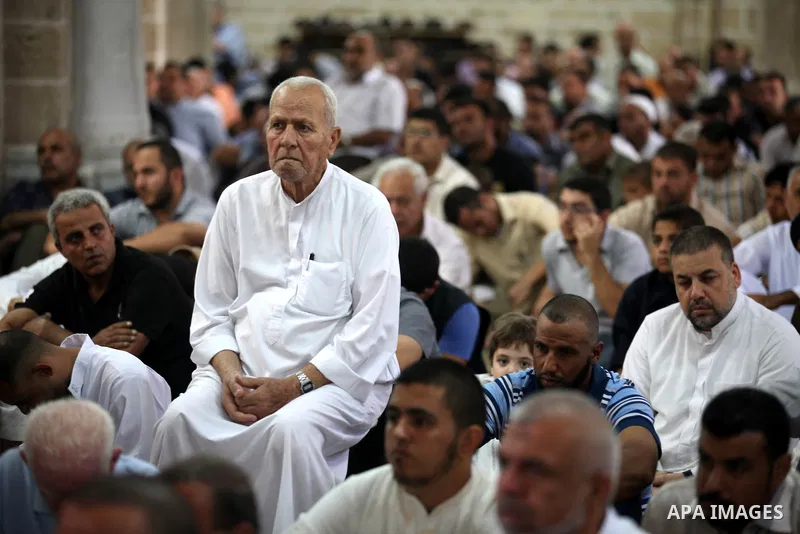 Palestinians attend Friday prayers in al-Omari Mosque before a demonstration against the controversial film 'Innocence of Muslims' in Gaza city, on September 14, 2012. The controversial low budget film reportedly made by...