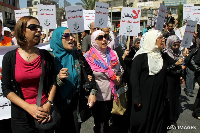 Palestinian protesters shout slogans during a demonstration against the high cost of living in the West Bank city of Nablus, Sept. 15, 2012. The Prime Minister pledged earlier that the Palestinian Authority will decrease...