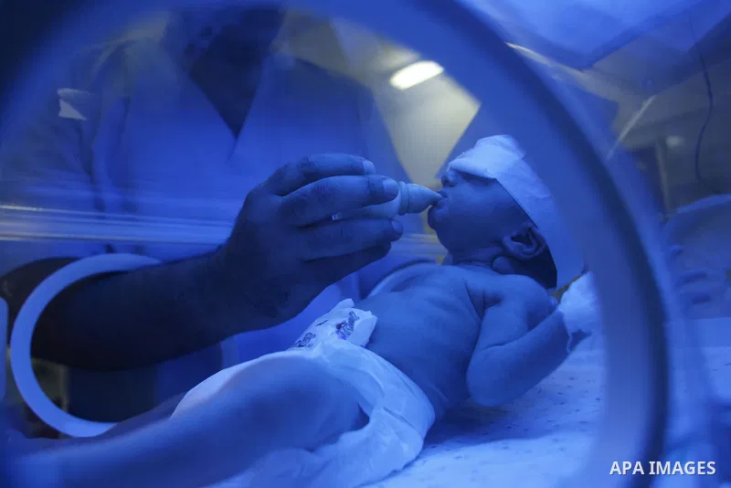 A nurse attends to a Palestinian infant in an incubator at Emirates Hospital in Rafah in Gaza Strip on Sep.17, 2012. Photo by Eyad Al Baba