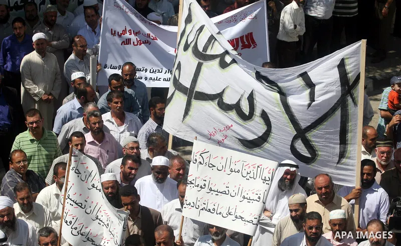 Hundreds of Palestinians hold a peaceful sit-in in the West Bank city of Ramallah on September 17, 2012 against an anti-Islam film that has sparked violent demonstrations in the Muslim world. The low-budget, US-produced...