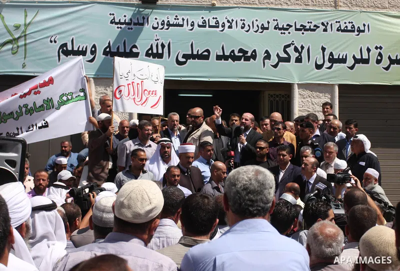 Hundreds of Palestinians hold a peaceful sit-in in the West Bank city of Ramallah on September 17, 2012 against an anti-Islam film that has sparked violent demonstrations in the Muslim world. The low-budget, US-produced...
