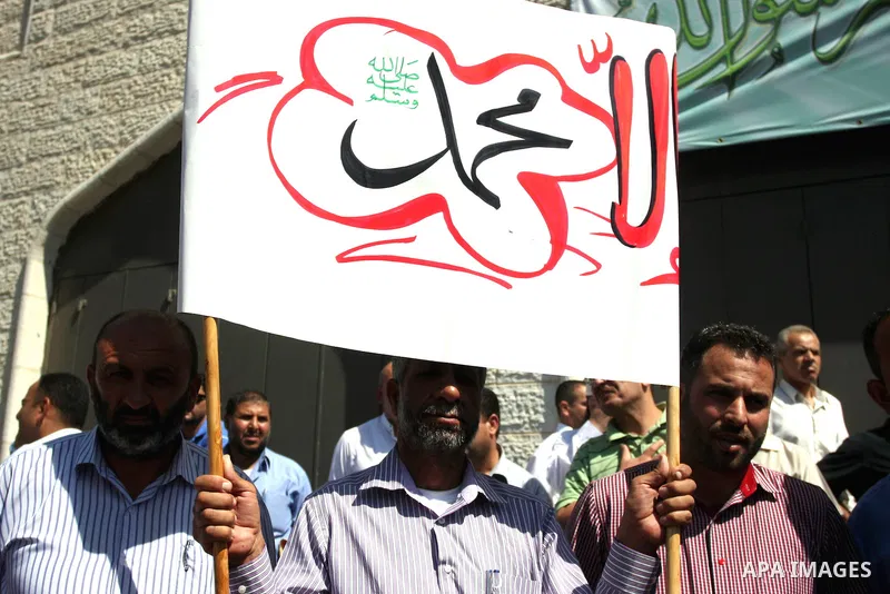 Hundreds of Palestinians hold a peaceful sit-in in the West Bank city of Ramallah on September 17, 2012 against an anti-Islam film that has sparked violent demonstrations in the Muslim world. The low-budget, US-produced...
