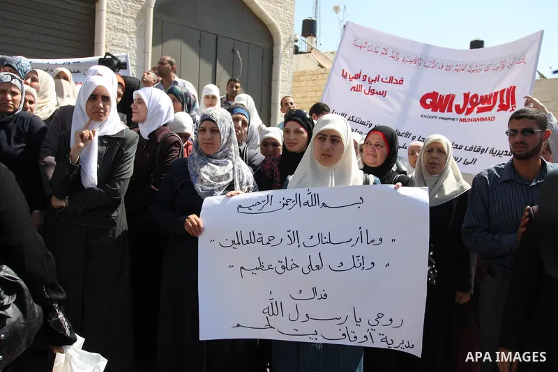 Hundreds of Palestinians hold a peaceful sit-in in the West Bank city of Ramallah on September 17, 2012 against an anti-Islam film that has sparked violent demonstrations in the Muslim world. The low-budget, US-produced...