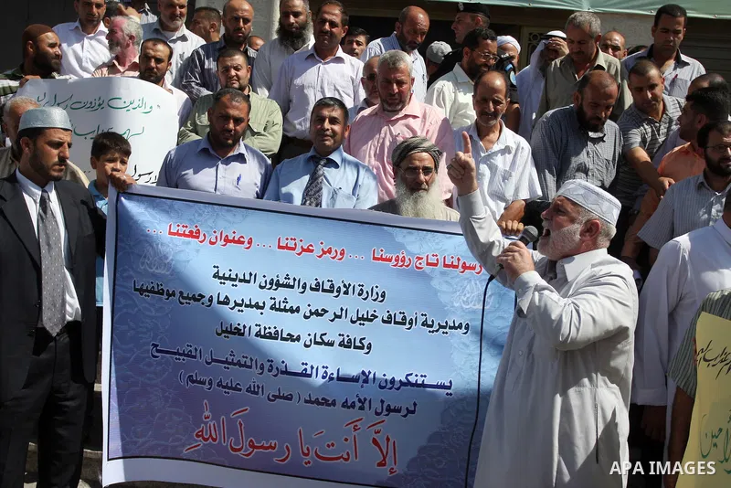 Hundreds of Palestinians hold a peaceful sit-in in the West Bank city of Ramallah on September 17, 2012 against an anti-Islam film that has sparked violent demonstrations in the Muslim world. The low-budget, US-produced...