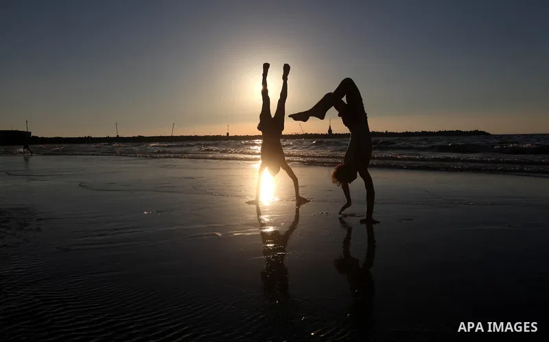 Palestinian youths play at the beach of Gaza city, Sept 17, 2012. Photo by Majdi Fathi