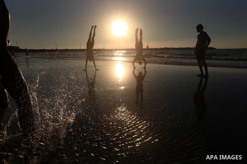 Palestinian youths play at the beach of Gaza city, Sept 17, 2012. Photo by Majdi Fathi