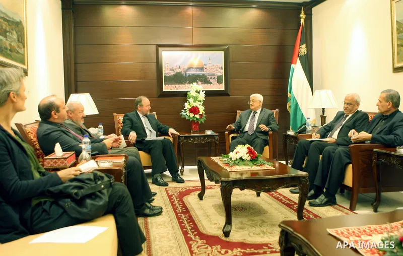 Palestinian President Mahmoud Abbas (Abu Mazen) meets with the European Union's representative to the Palestinian National Authority John Gat Rutter, the British Consul General Sir Vincent Fein, and the French Consul Fre...