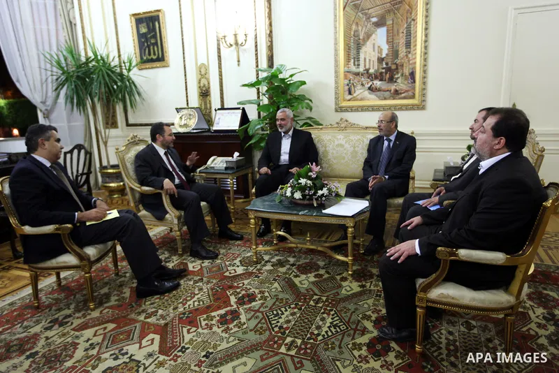 Palestinian Prime minister in Gaza strip, Ismail Haniya, meets with Dr. Hesham Qandil, in his office in Gaza city, on Sep. 18, 2012. Photo by Ahmed Shaat