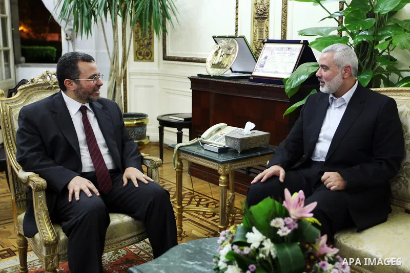 Palestinian Prime minister in Gaza strip, Ismail Haniya, meets with Dr. Hesham Qandil, in his office in Gaza city, on Sep. 18, 2012. Photo by Ahmed Shaat